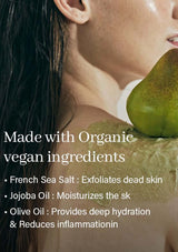 Person applying a green facial mask with text about organic vegan ingredients