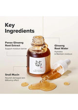 Skincare product with key ingredients including Panax Ginseng Root Extract and Snail Mucin on a beige background.