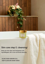 Green jar of skincare product on a bathtub with a plant in the background