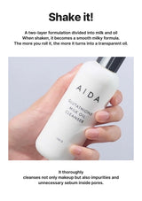 Hand holding a bottle of AIDA Glutathione Milk Oil Cleanser with text describing its two-layer formulation.