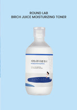 Bottle of Round Lab Birch Juice Moisturizing Toner on a light blue background