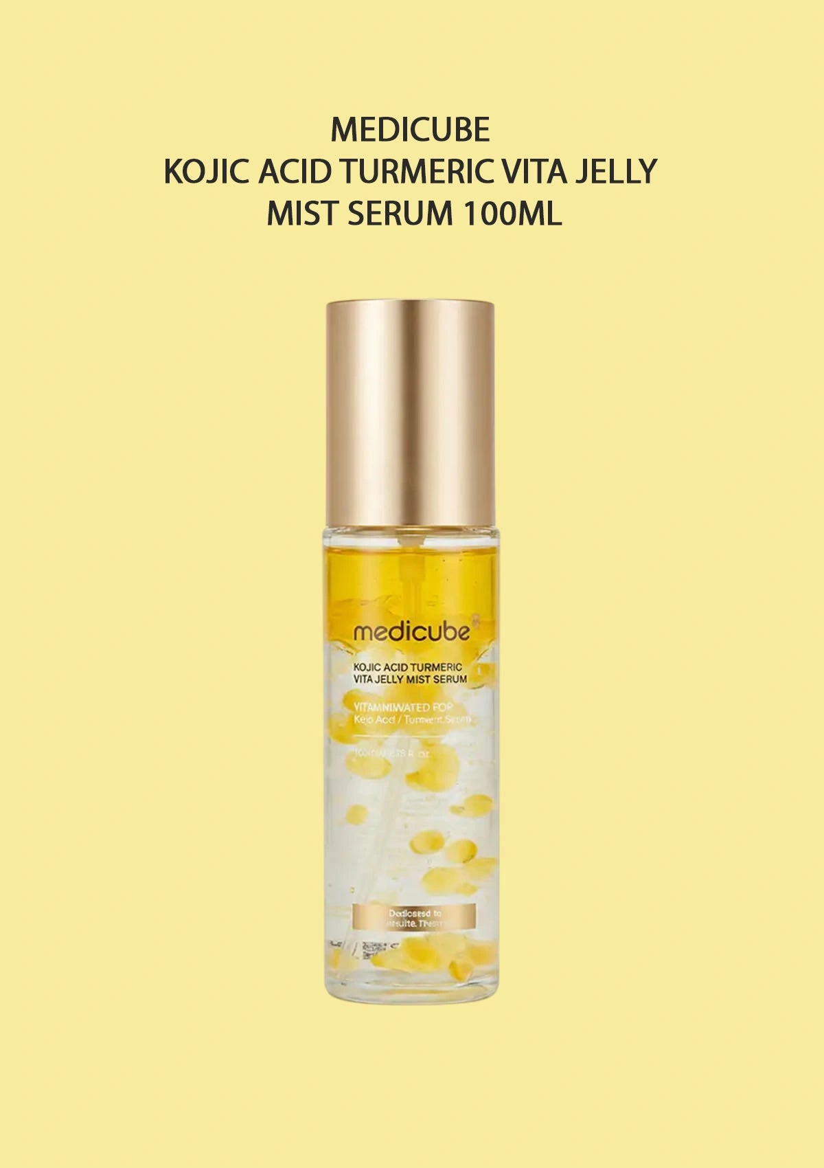 Medicube Kojic Acid Turmeric Vita Jelly Mist Serum 100ml bottle on a yellow background