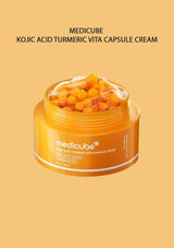 Medicube Kojic Acid Turmeric Vita Capsule Cream jar on a beige background