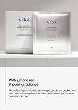 Two AIDA glutathione brightening masks on a gray surface with text describing the product.