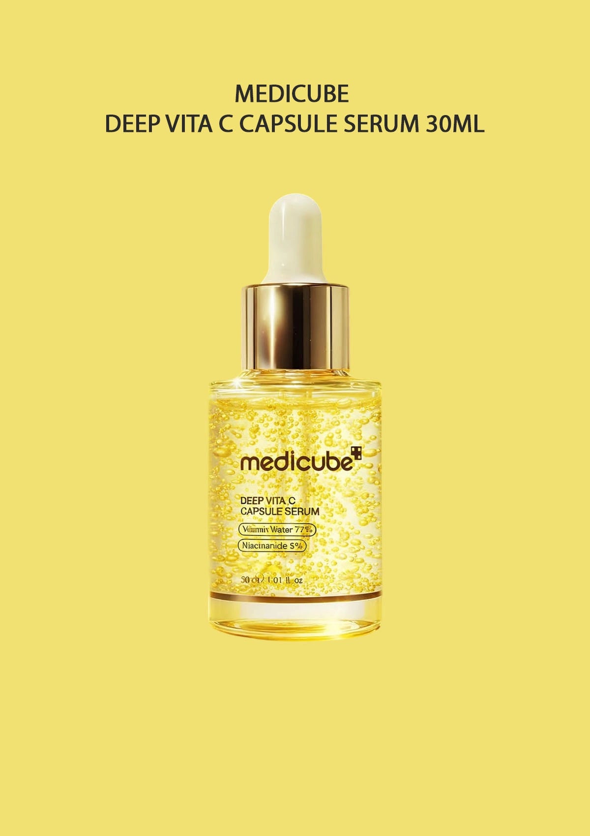 Medicube Deep Vita C Capsule Serum 30ml bottle on a yellow background