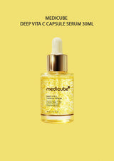 Medicube Deep Vita C Capsule Serum 30ml bottle on a yellow background