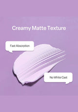 Creamy matte texture swatch on a purple background with text indicating fast absorption and no white cast.