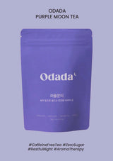 Purple tea package with 'Odada' branding on a light purple background