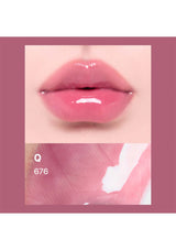 Close-up of a pink lip with a blurred background