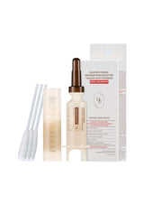 Skincare product set with serum, applicator, and packaging on a white background