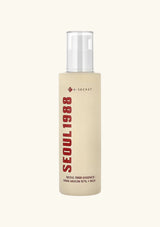 Skincare bottle labeled 'Seoul 1988' on a beige background