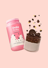 Pink 'Shake Baby' container with a dessert shake on a pink background