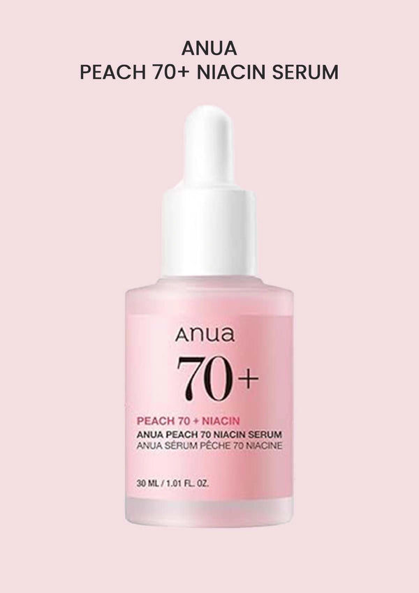 Anua Peach 70+ Niacin Serum bottle on a light pink background