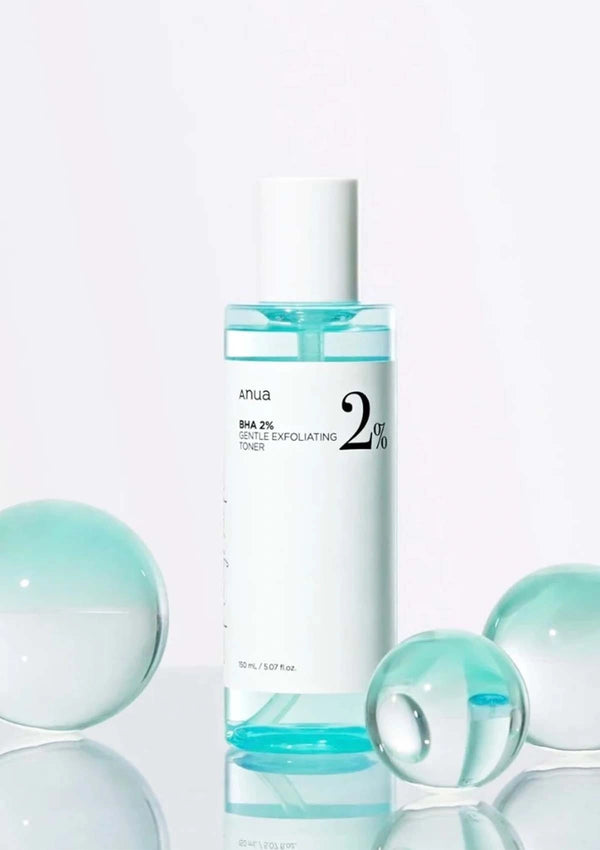 Skincare bottle with blue liquid and bubbles on a white background