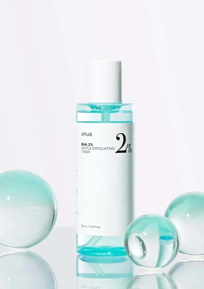 Skincare bottle with blue liquid and bubbles on a white background