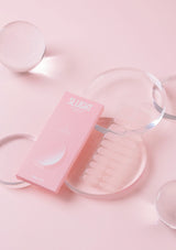 Pink skincare product with 'Slight' branding on a pink background
