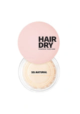 Hair dry powder perfume with pink cap and beige container on a white background