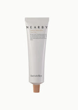 Hand cream tube labeled 'Nearby' by 'hersteller' on a white background