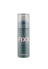 Makeup setting spray bottle labeled 'Real Matte Make Up Setting Fixx' on a white background