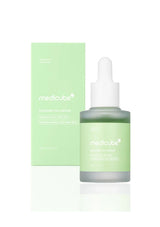 Medicube skincare bottle and box on a white background