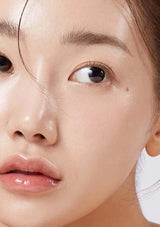 Close-up of a person's face with a focus on the eye area.