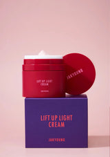 Red jar of Lift Up Light Cream by Jakyoung on a pink background