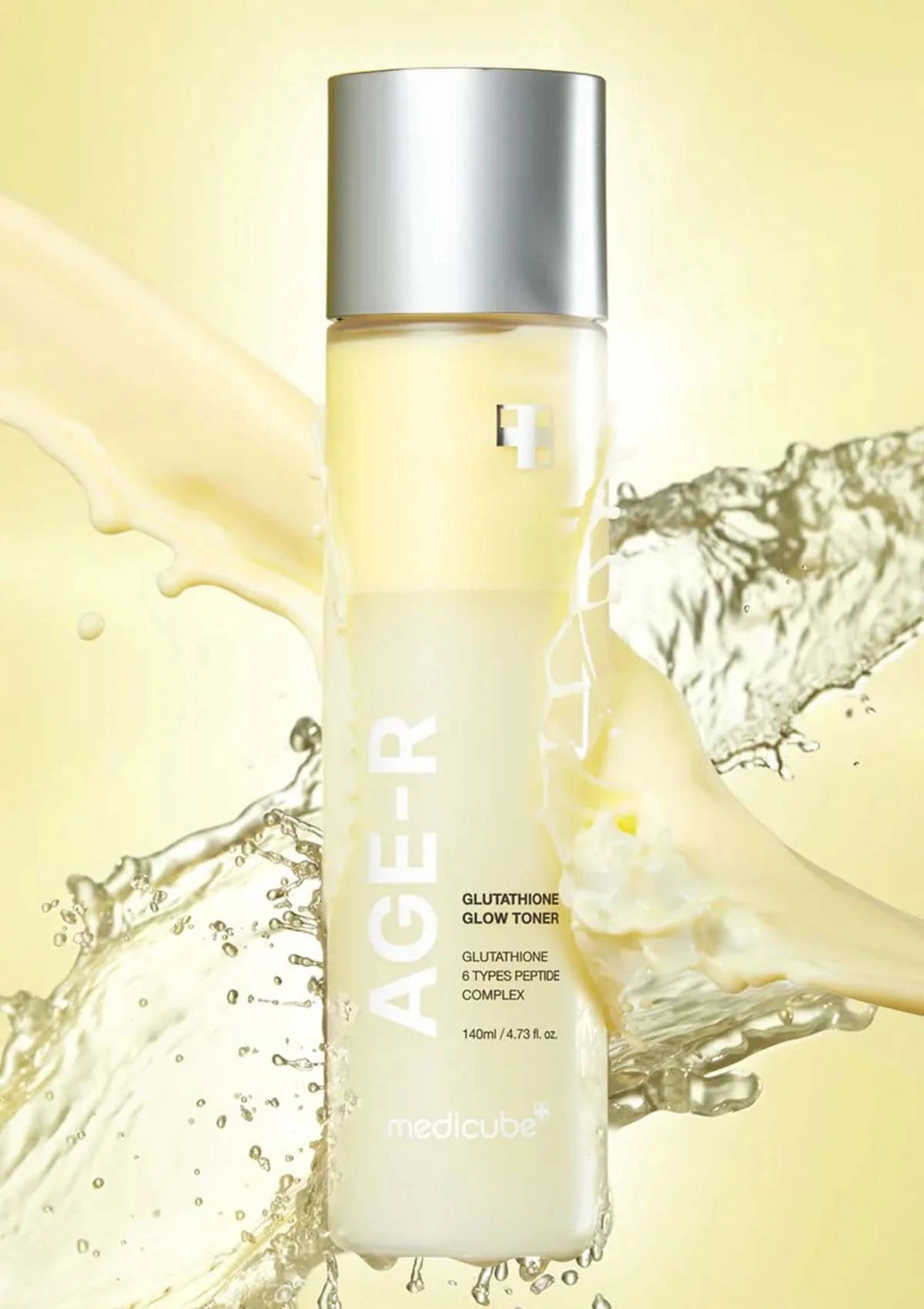 Skincare bottle labeled 'AGE-R' with a yellow liquid splash background