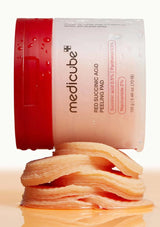 Medicube Red Succinic Acid Peeling Pad packaging with peeling pads on a light background
