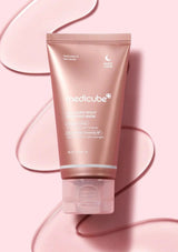Medicube facial mask tube on a pink background