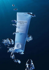 Skincare product with water droplets on a dark blue background