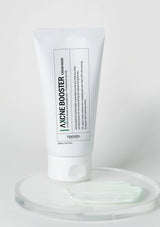 Tube of 'AXCHE BOOSTER' cream mask on a white background