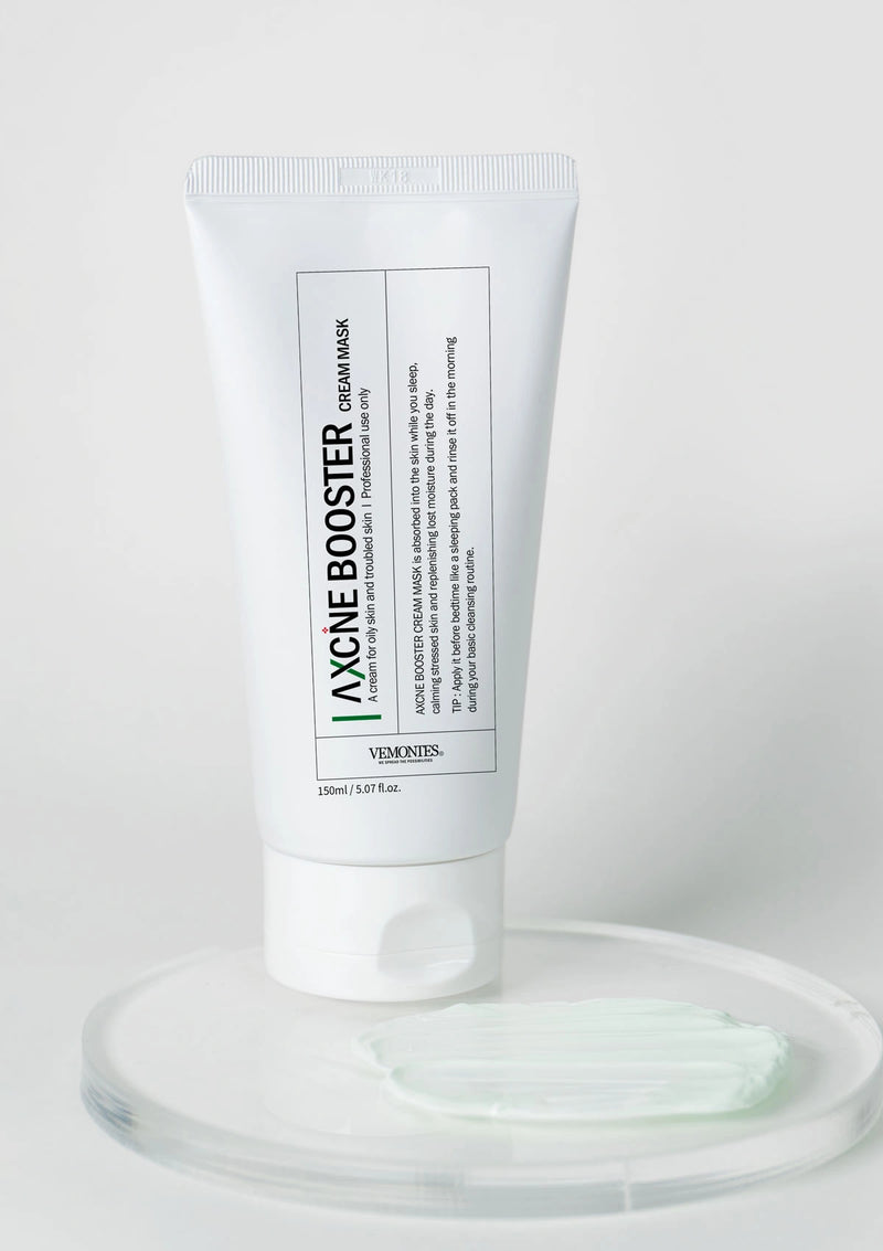 Tube of 'AXCHE BOOSTER' cream mask on a white background