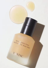 Yunjac skin perfecting protective base prep bottle with a droplet on a light background