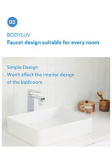 Compact white BODYLUV Washbasin Tap Ver.2 fitted beneath a basin faucet