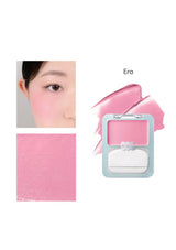 Pink blush compact with color swatch and application on a white background