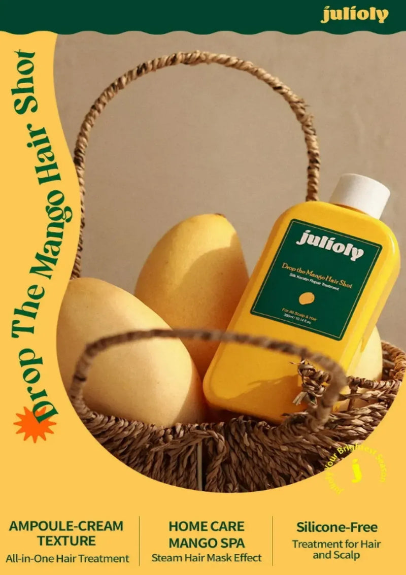 Yellow bottle of juliofy hair shampoo with mangoes in a basket on a beige background