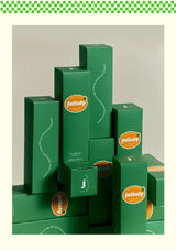 Stack of green boxes with 'juliofy' branding on a light gray background