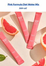 Four pink Shake Baby grapefruit flavor single-serve packets arranged on a light beige surface with grapefruit slices and a green leaf. Text at the top reads 'Pink Formula Diet Water Mix Join us!'.