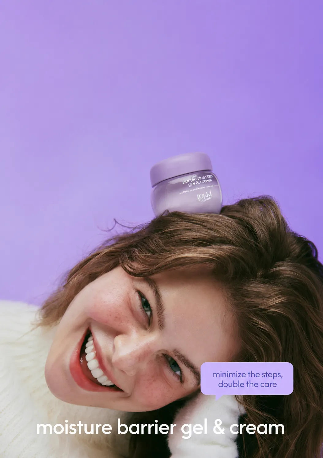 Woman balancing a TOKKI ON THE MOON Purple Rice PDRN Gel & Cream 50g jar against a purple background