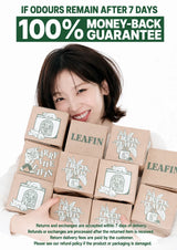 A smiling woman with short dark hair holds a stack of square cardboard boxes printed with 'LEAF TEA' and illustrated tea leaves. Large promotional text at the top reads 'IF ODOURS REMAIN AFTER 7 DAYS 100% MONEY-BACK GUARANTEE' on a white background.