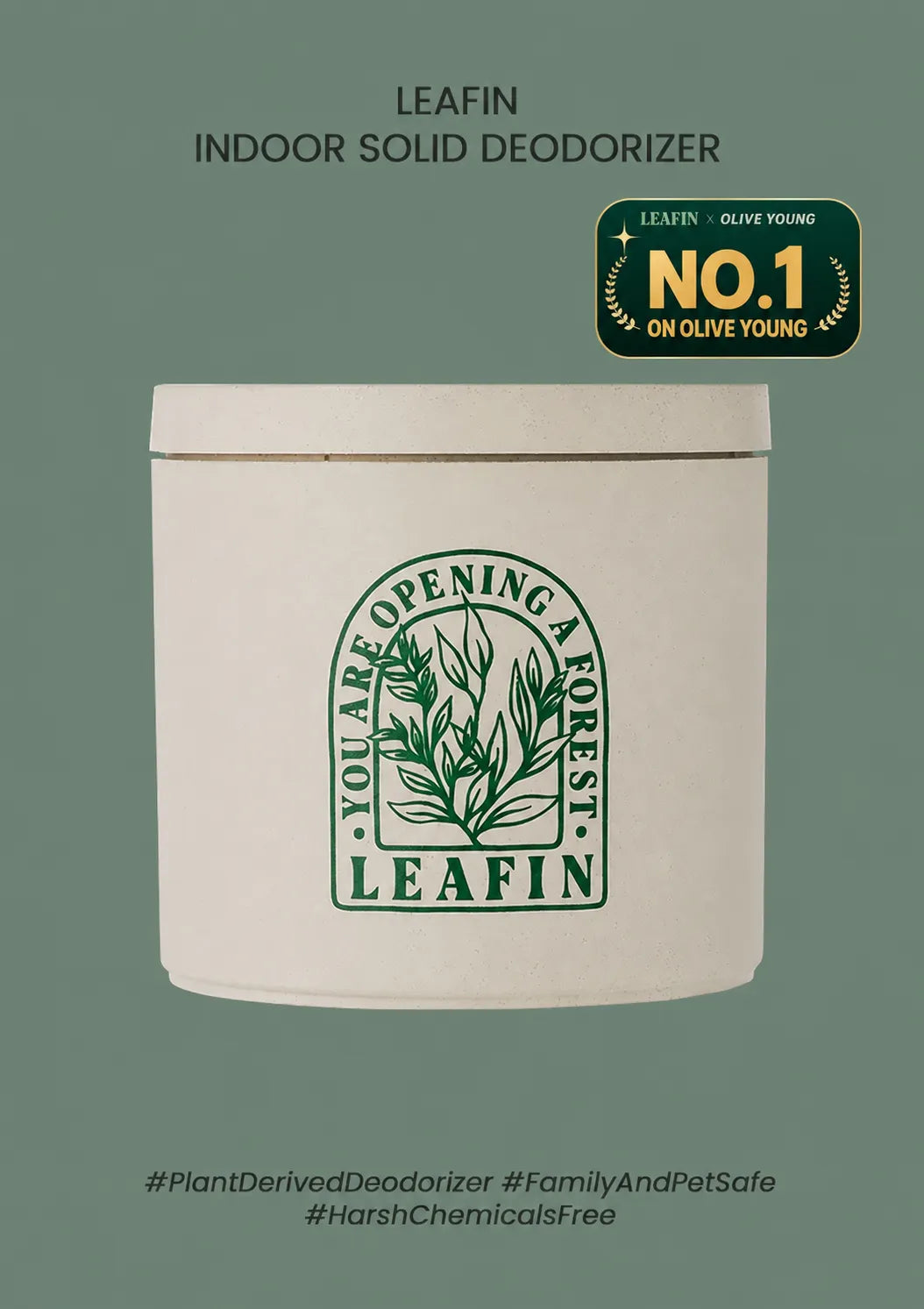 A white cylindrical tin of LEAFIN Indoor Solid Deodorizer on a muted sage green background. The tin features a green botanical logo with the text 'You Are Opening a Forest' and 'LEAFIN'.