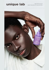 iUNIK Volufiline Grape PDRN Serum model holding purple serum bottle