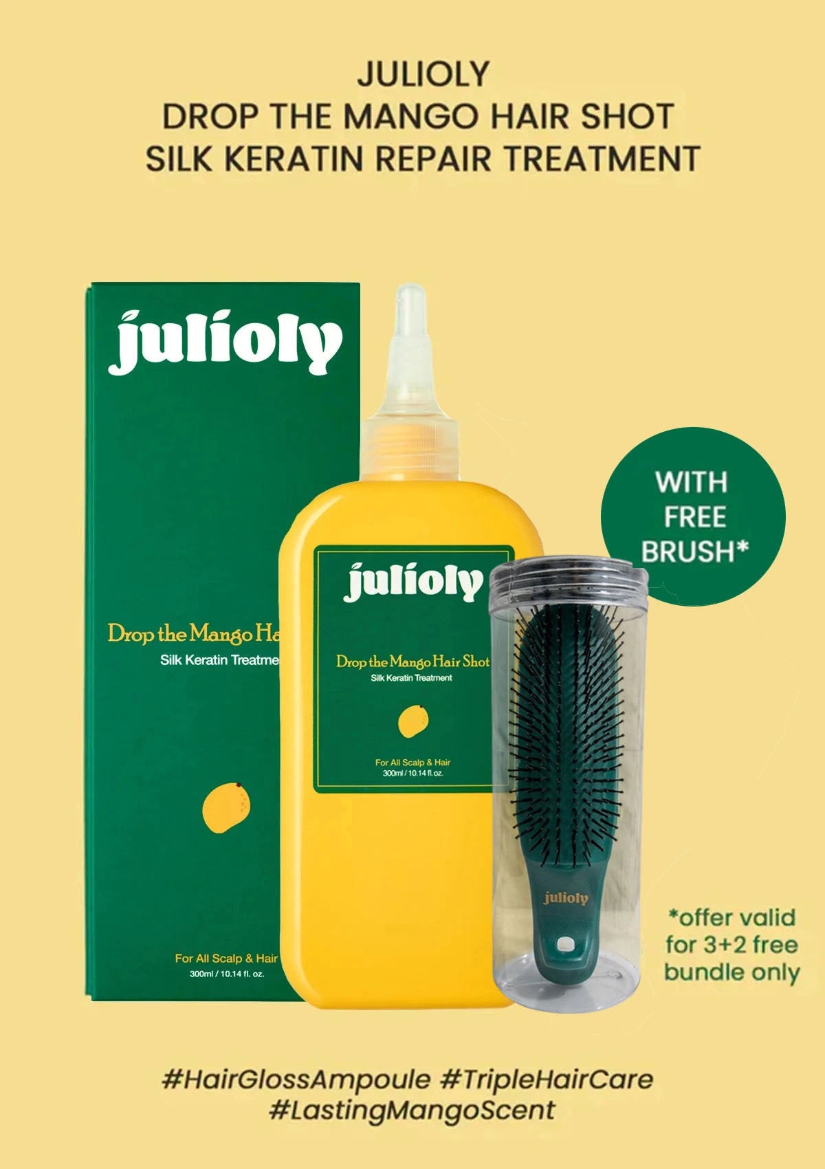 Julioly Drop the Mango Hair Shot Silk Keratin Repair Treatment with packaging and free brush on a beige background