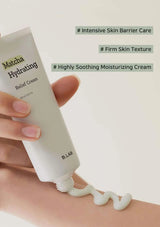 Hand applying a tube of B.LAB Matcha Hydrating Relief Cream to skin with text highlighting benefits.