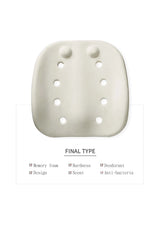 White orthopedic cushion with holes on a white background