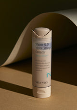 Vely Vely Nano N.D 1200 Lifting Cream tube on a brown background