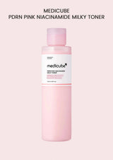 Pink Medicube toner bottle on a light pink background