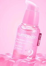 Pink serum bottle with 'numbuzin' branding on a pink background