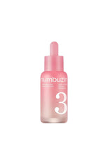 Pink bottle of Numbuzin numbing cream on a white background