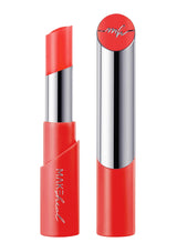 Two red lipsticks with silver accents on a white background